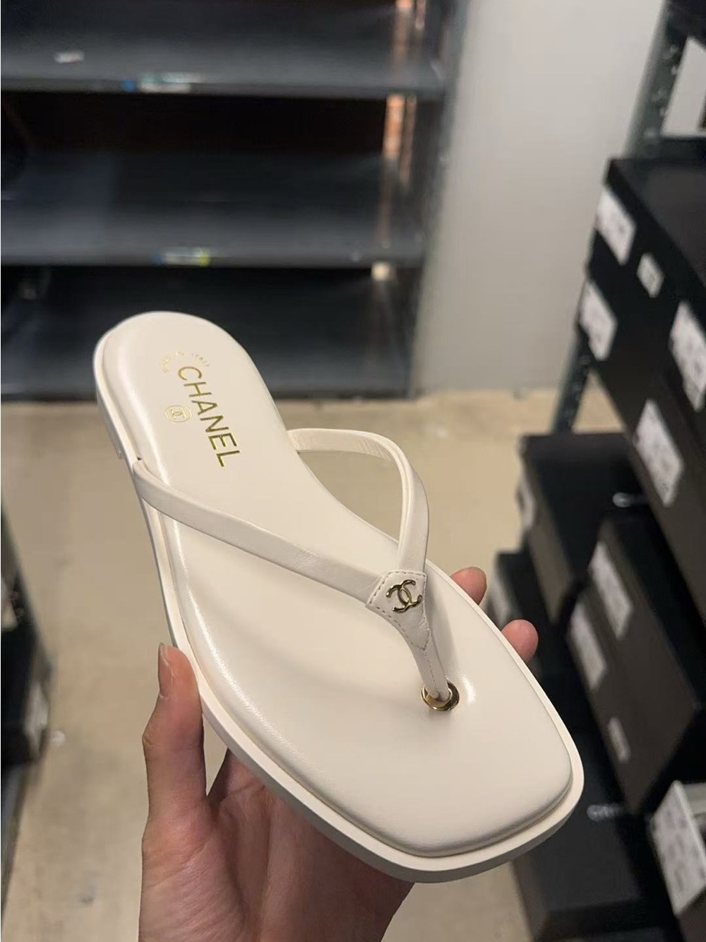 CHANEL white Leather Times Square Thong Sandals with Gold CC Charm
